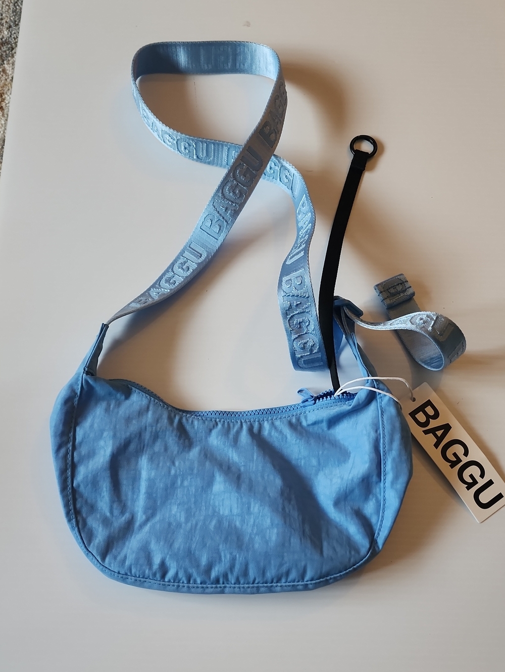 BAGGU Small Nylon Light Blue Crescent Crossbody Bag. NWT